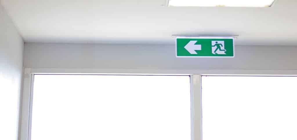 Fire Exit sign on the ceiling entry the fire escape